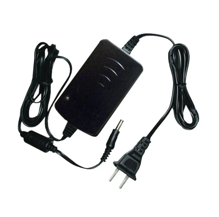 FUENTE ZK 12VDC 1A CON EXTENSOR PARA CAMARAS Y GRABADORES 